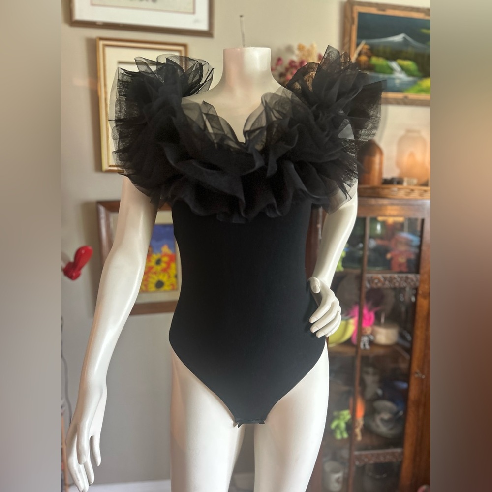 Vintage Black Ruffled neckline rubbed bodysuit w snaps. Size medium FP inspired